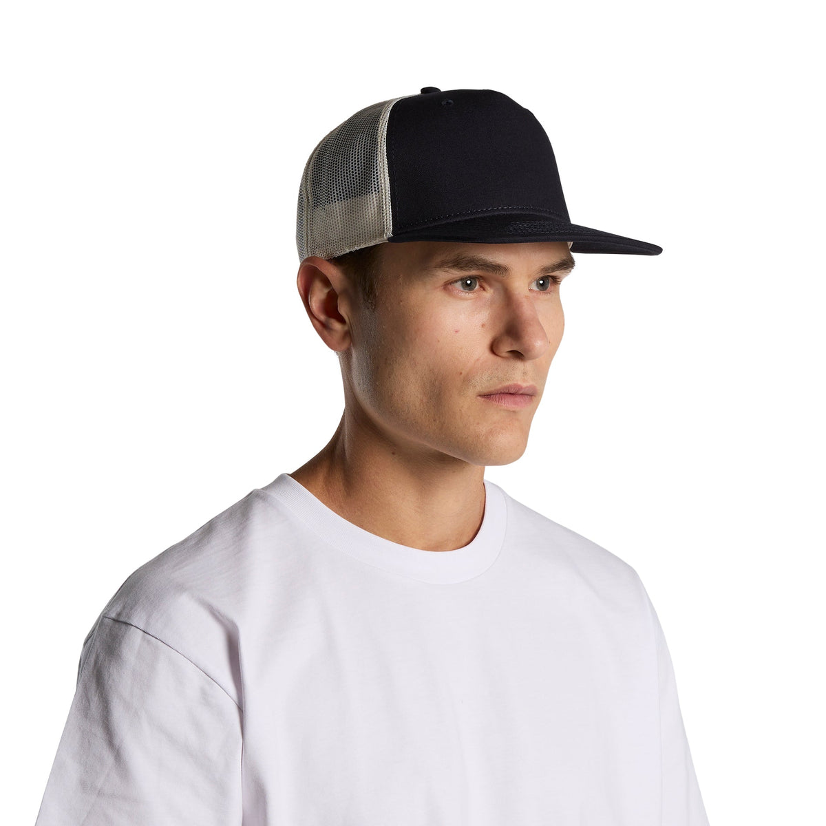 Custom printed AS Colour Stock Contrast Trucker Cap in Navy/Ecru, three-quarter view on model