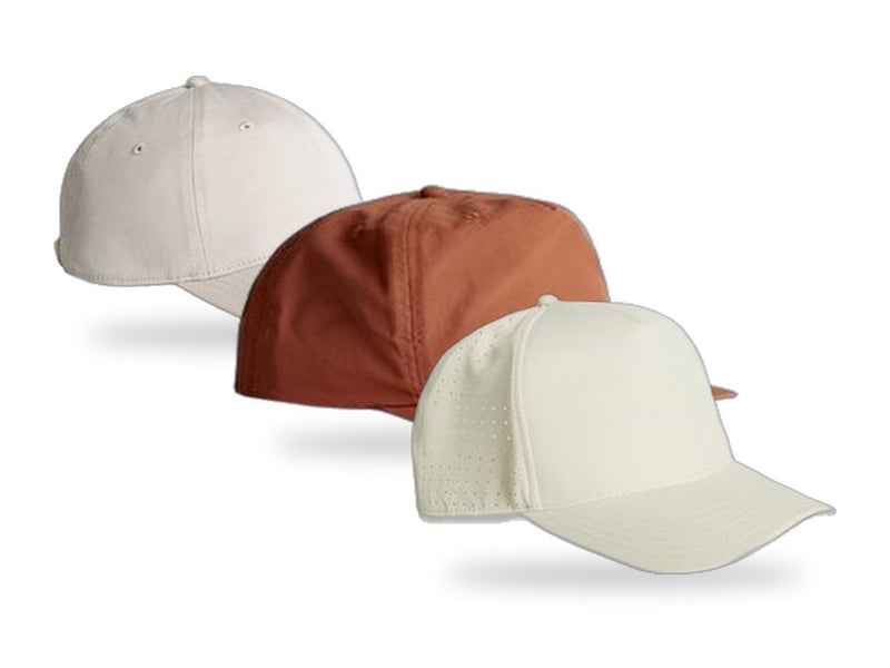 Three caps in side profile, overlapping from back to front: a low-profile Access Cap, a mid-profile Surf Cap and a high-profile Frame Perforated Cap.